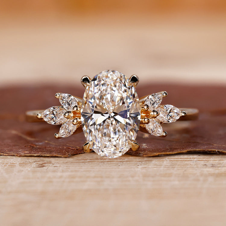 Oval diamond ring in yellow gold with a classic prong setting.