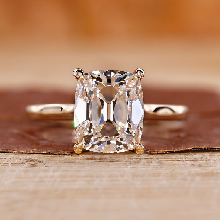 Old Mine Cut Diamond Ring is crafted with a cushion cut diamond and yellow gold ring.