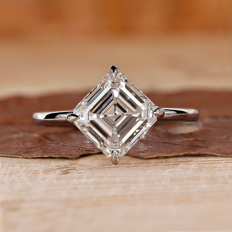 Asscher Cut Diamond Ring is crafted in a white gold ring with solitaire diamond style.