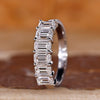 Emerald cut diamond band with a refined finish.