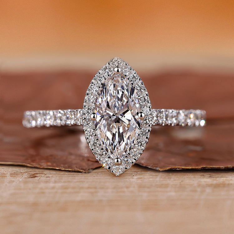 Marquise halo engagement ring in white gold.