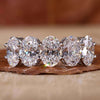 Oval diamond ring with a stunning prong setting for timeless elegance.