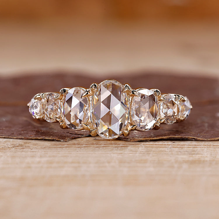 Rose cut diamond ring with oval center stone.