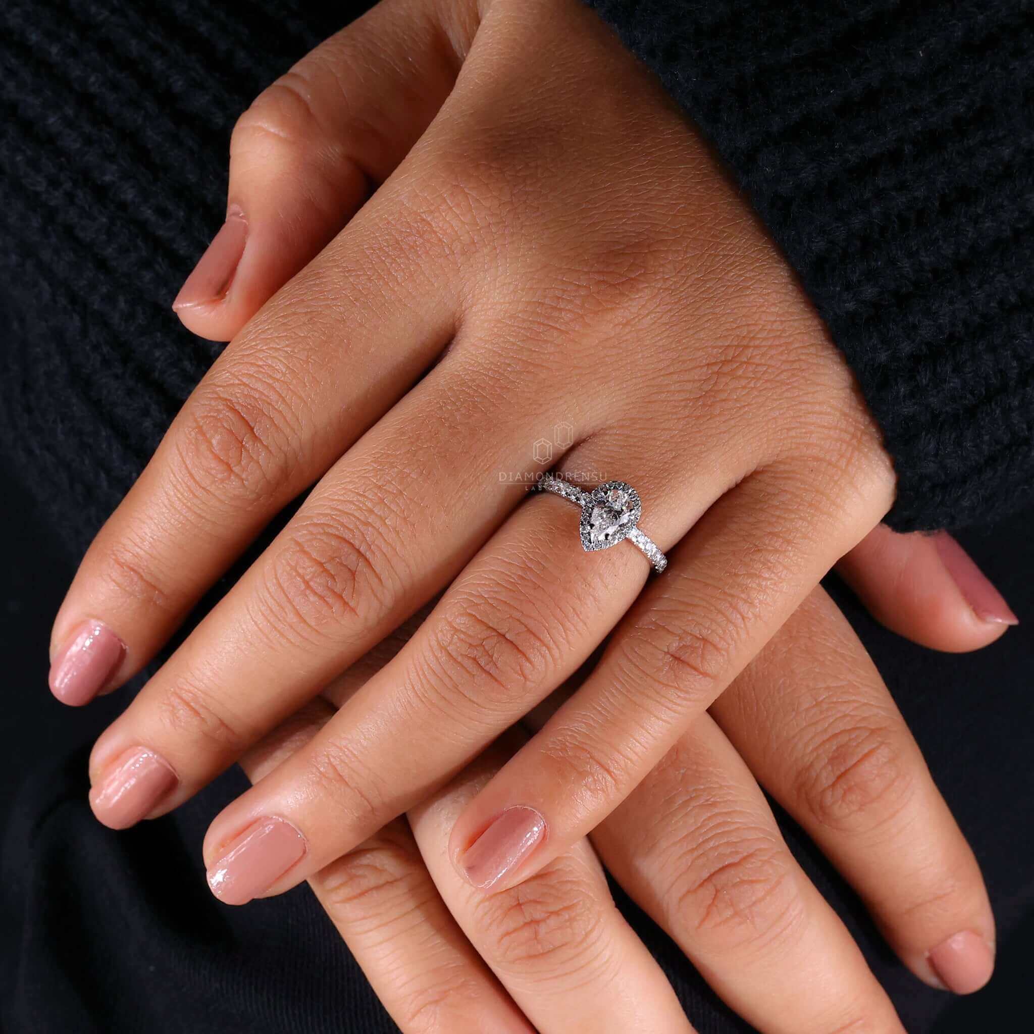 Pear ring halo crafted with igi certified Lab Grown Diamond in a beautifully designed pave setting.