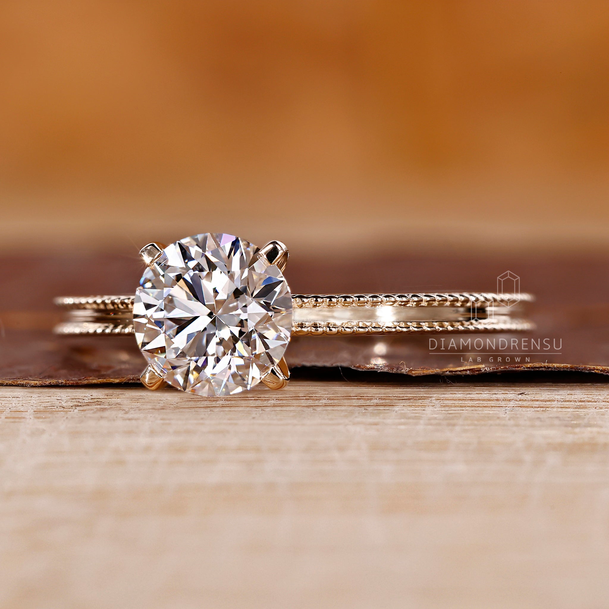 Handmade round diamond ring with tab prongs