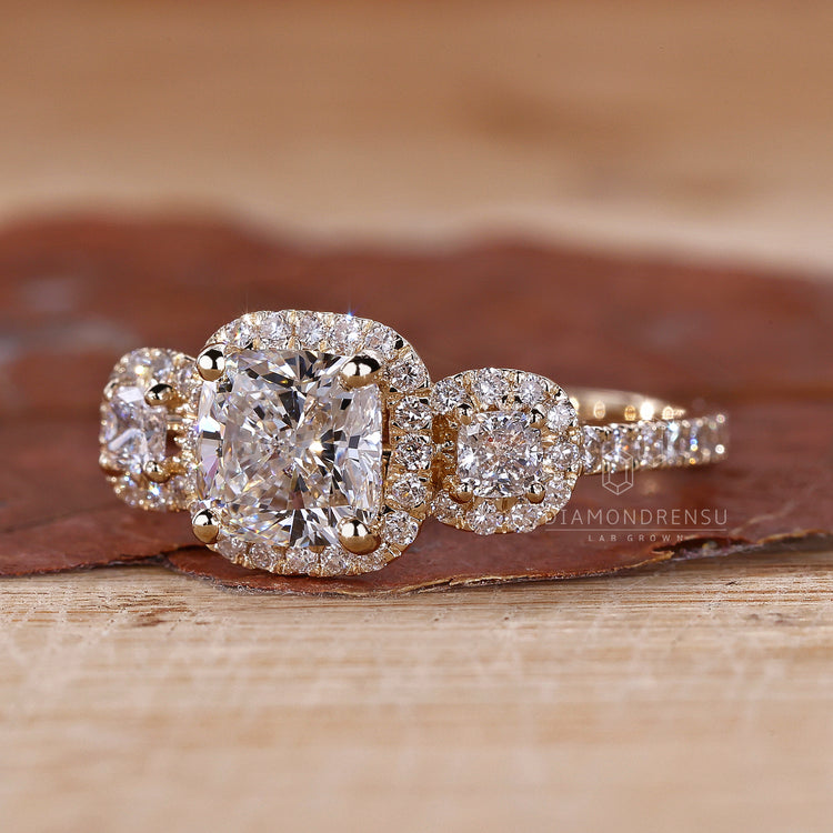 Three stone ring featuring bridge accent ring