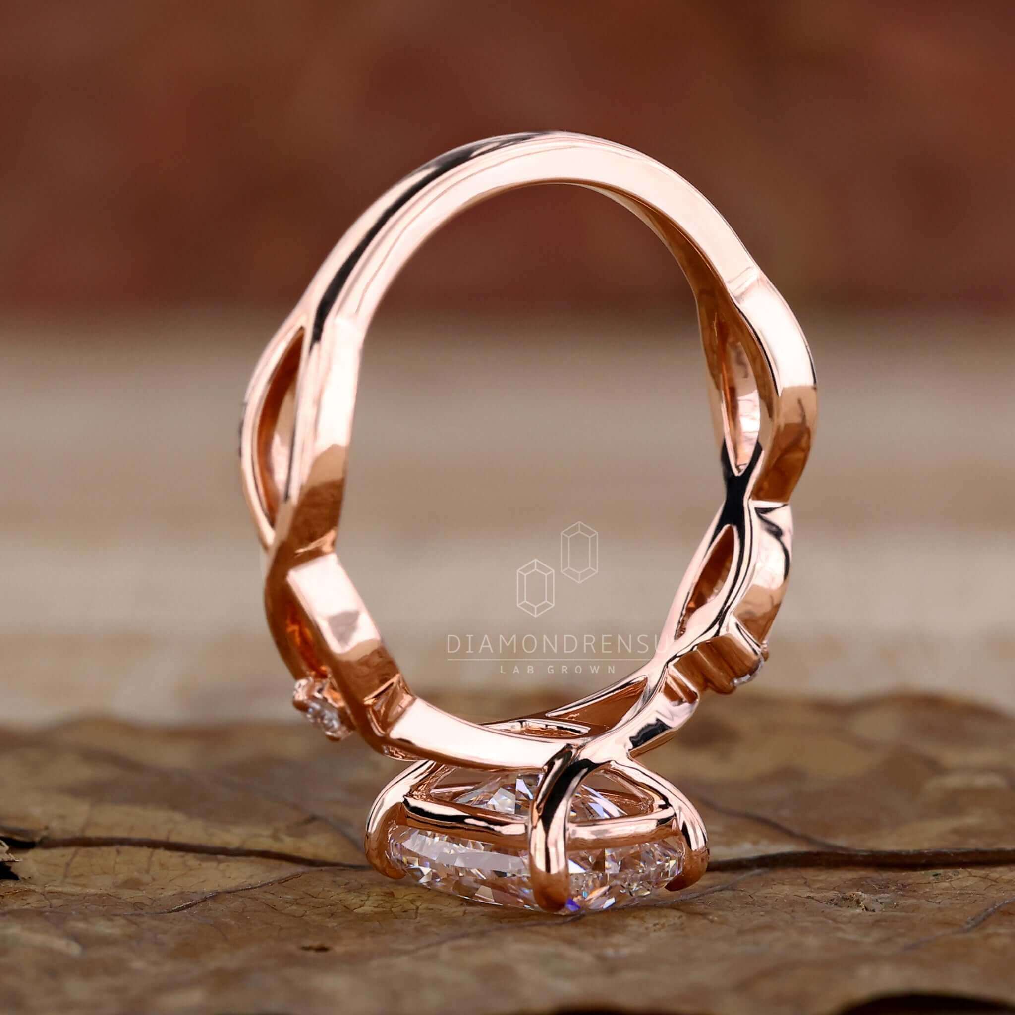Diamondrensu UK engagement ring in a claw prong setting.