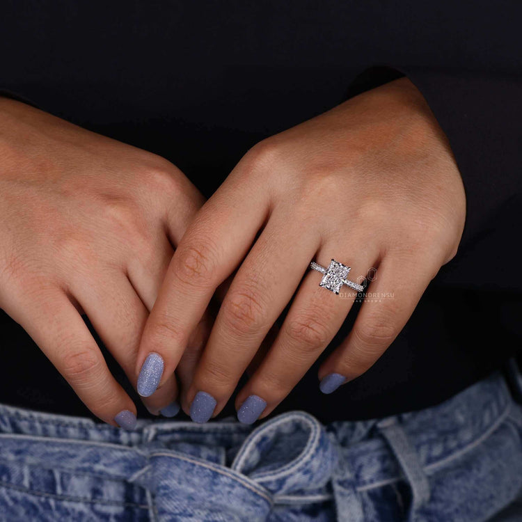 Radiant cut engagement ring hidden halo and pave design.