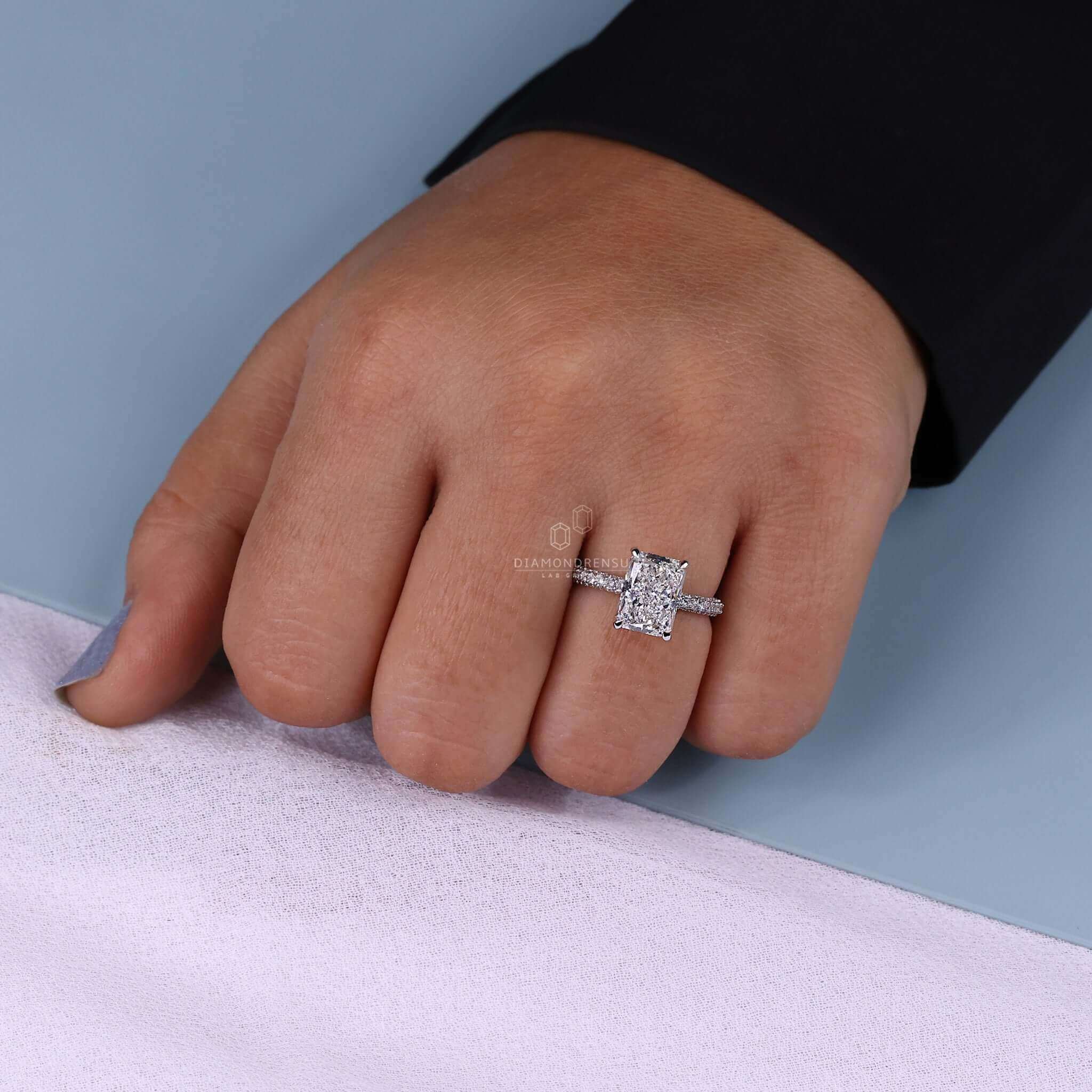 Radiant cut ring with lab-grown diamond and handmade design.