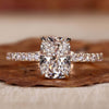 Cushion cut engagement ring with an elegant pave diamond ring design.