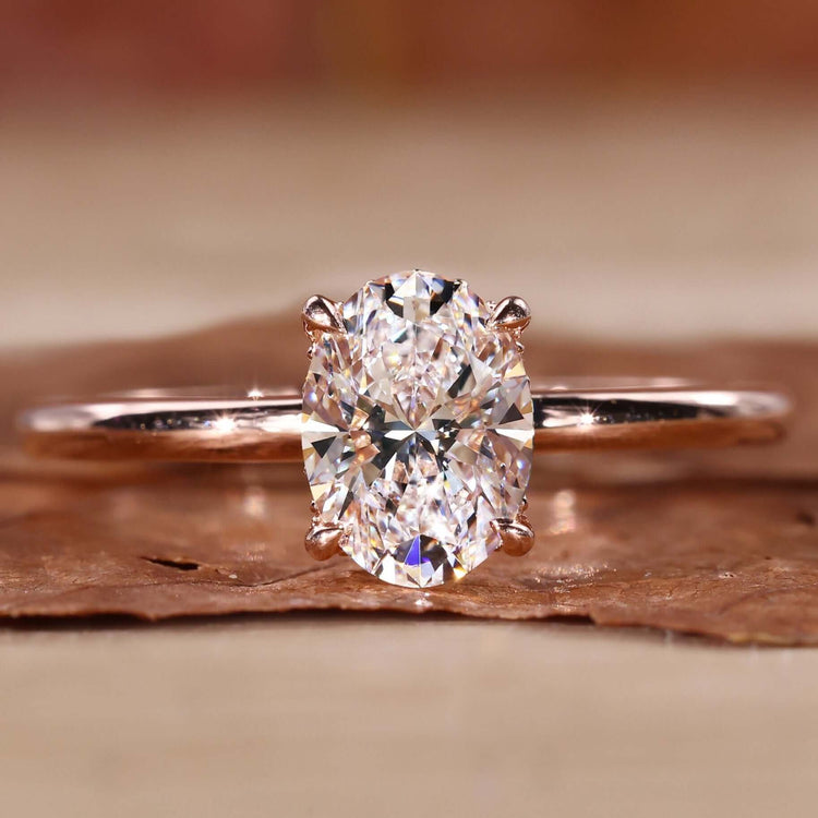 Hidden Halo Engagement Ring with oval cut diamond ring design.