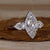 Handmade marquise ring with a v prong setting, perfect for unique engagement moments. Handmade marquise ring with a v prong setting, perfect for unique engagement moments.