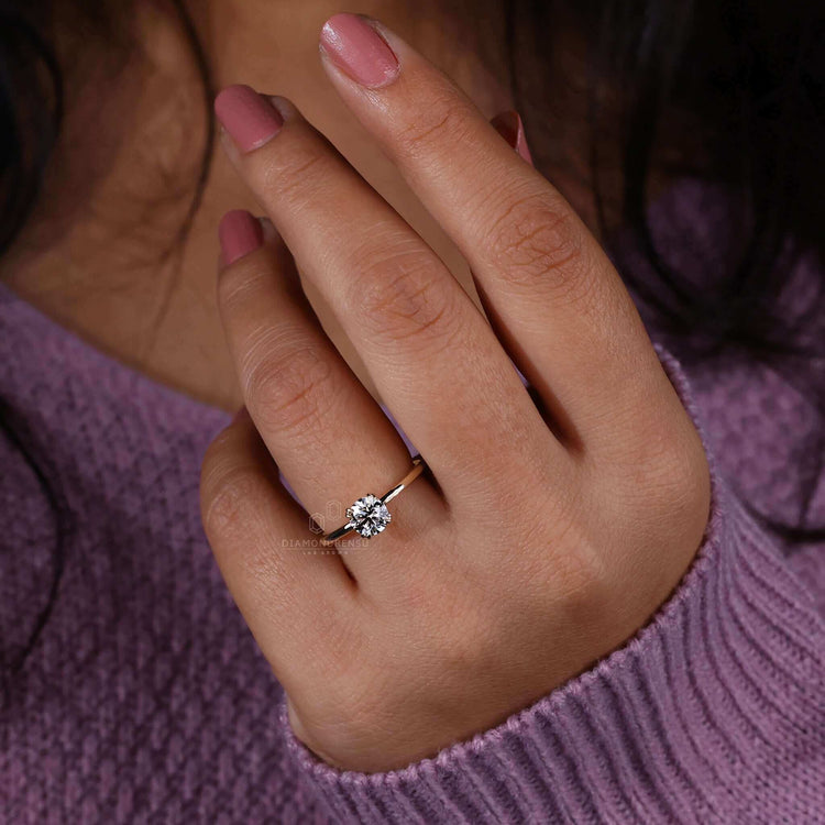 Yellow gold engagement ring with a solitaire design, perfect for modern yet timeless appeal.