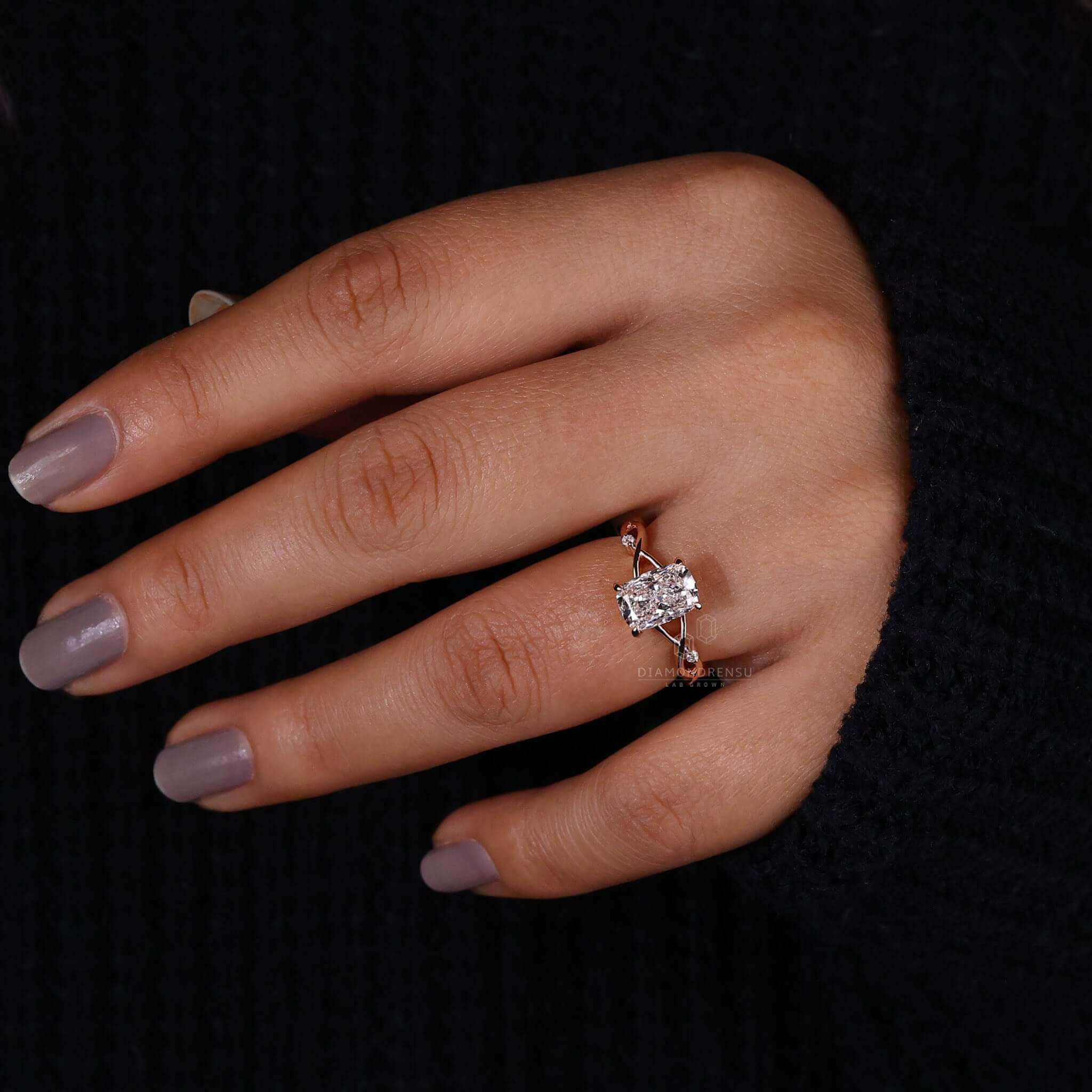 Handmade elongated cushion cut diamond ring for women.