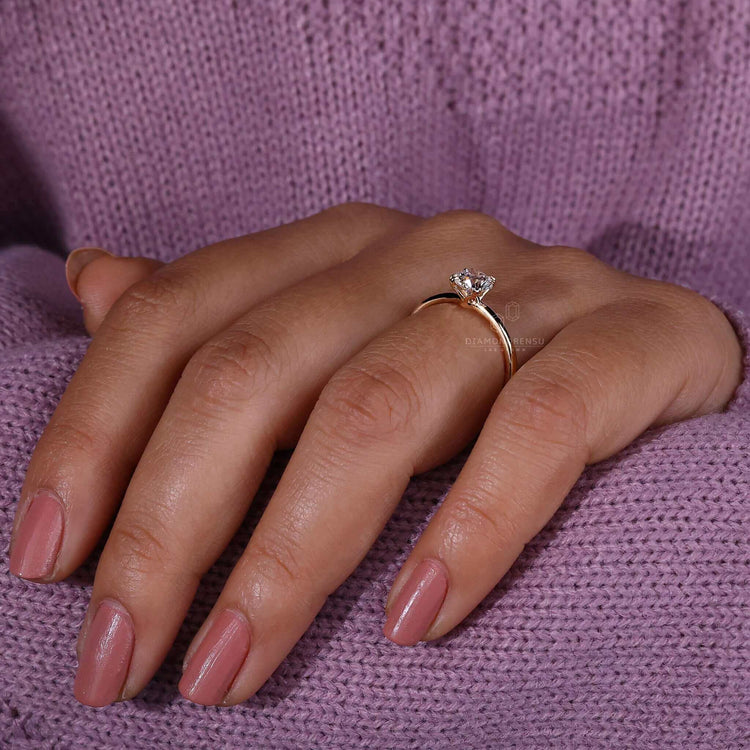Unique engagement ring with lab grown diamonds and handmade details for a personal touch.