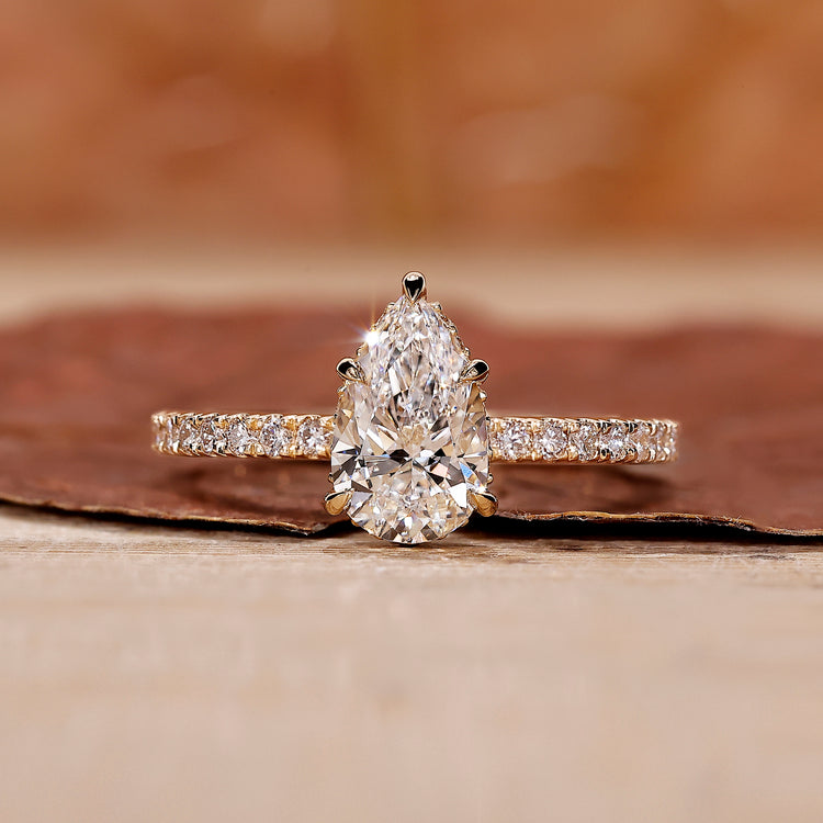 Pave Setting Ring with sparkling diamonds in yellow gold design.