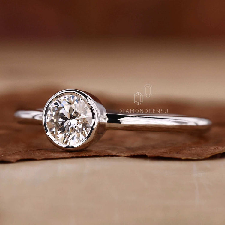 Bezel setting ring showcasing a secure diamond placement.