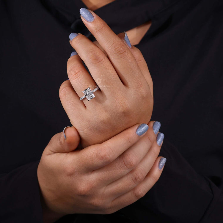 Engagement ring hidden halo with handmade jewellery finish.