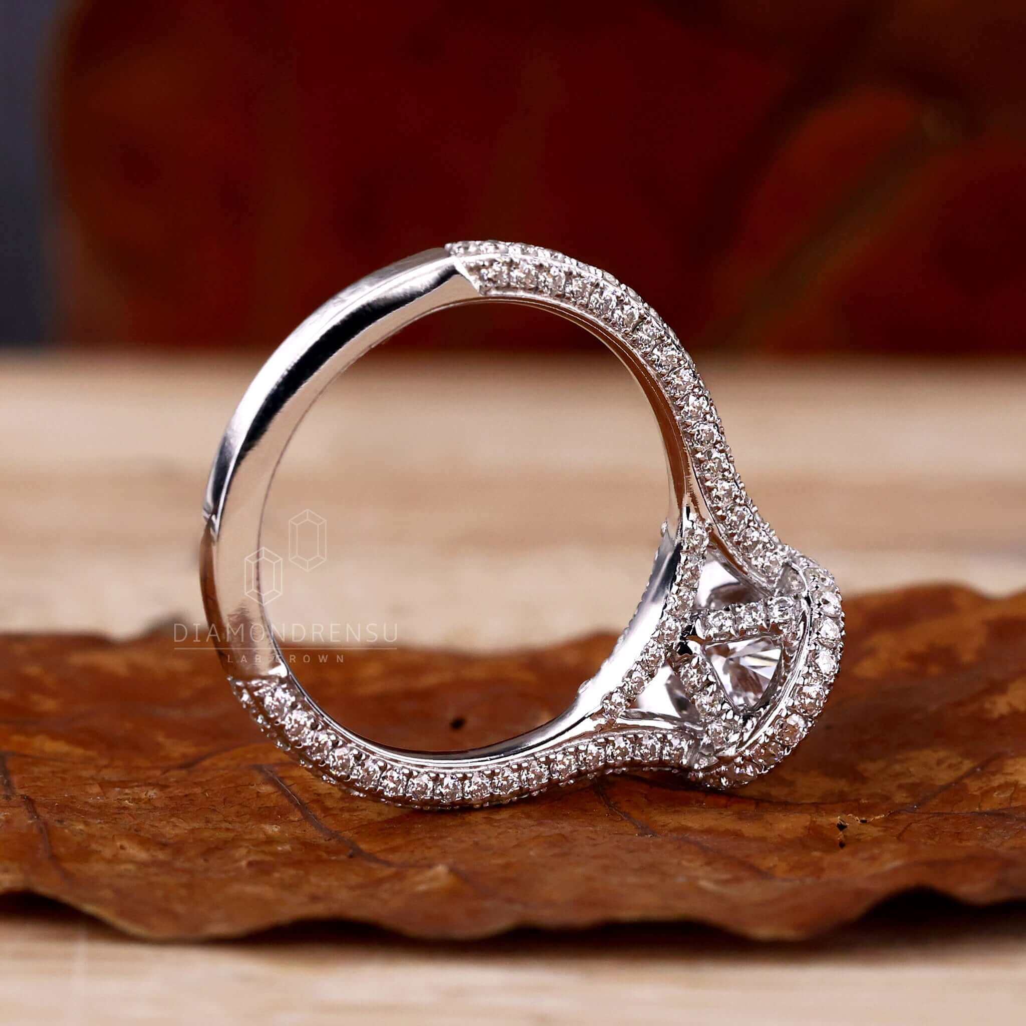 Double halo ring paired with a 5 prong claw setting for security and elegance.