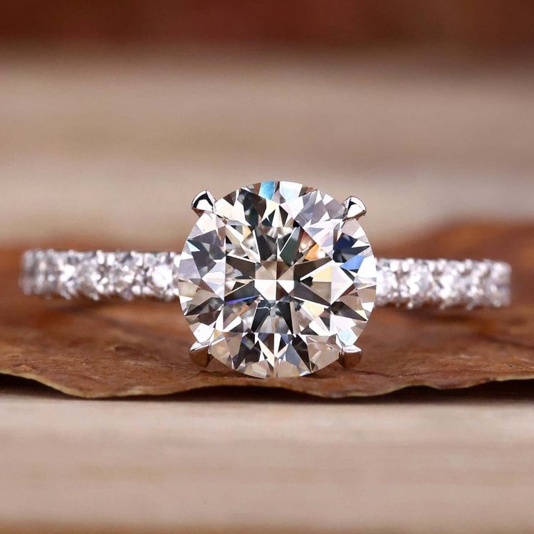 A stunning pave diamond ring with intricate detailing, perfect for engagements.