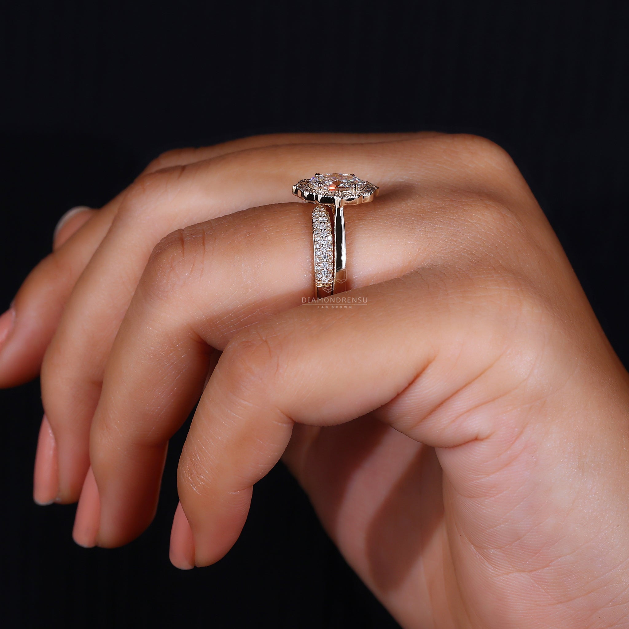 Milgrain setting oval bridal ring.