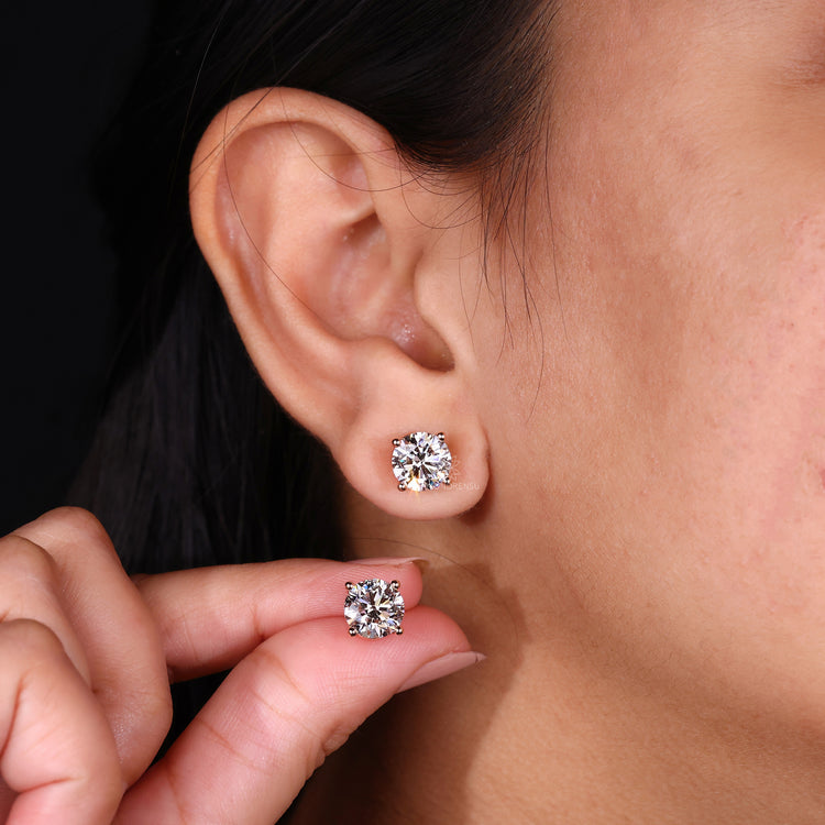Handmade rose gold diamond studs.
