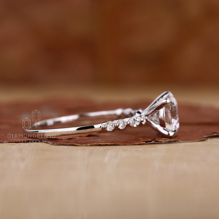 Marquise and round cut pave band ring.