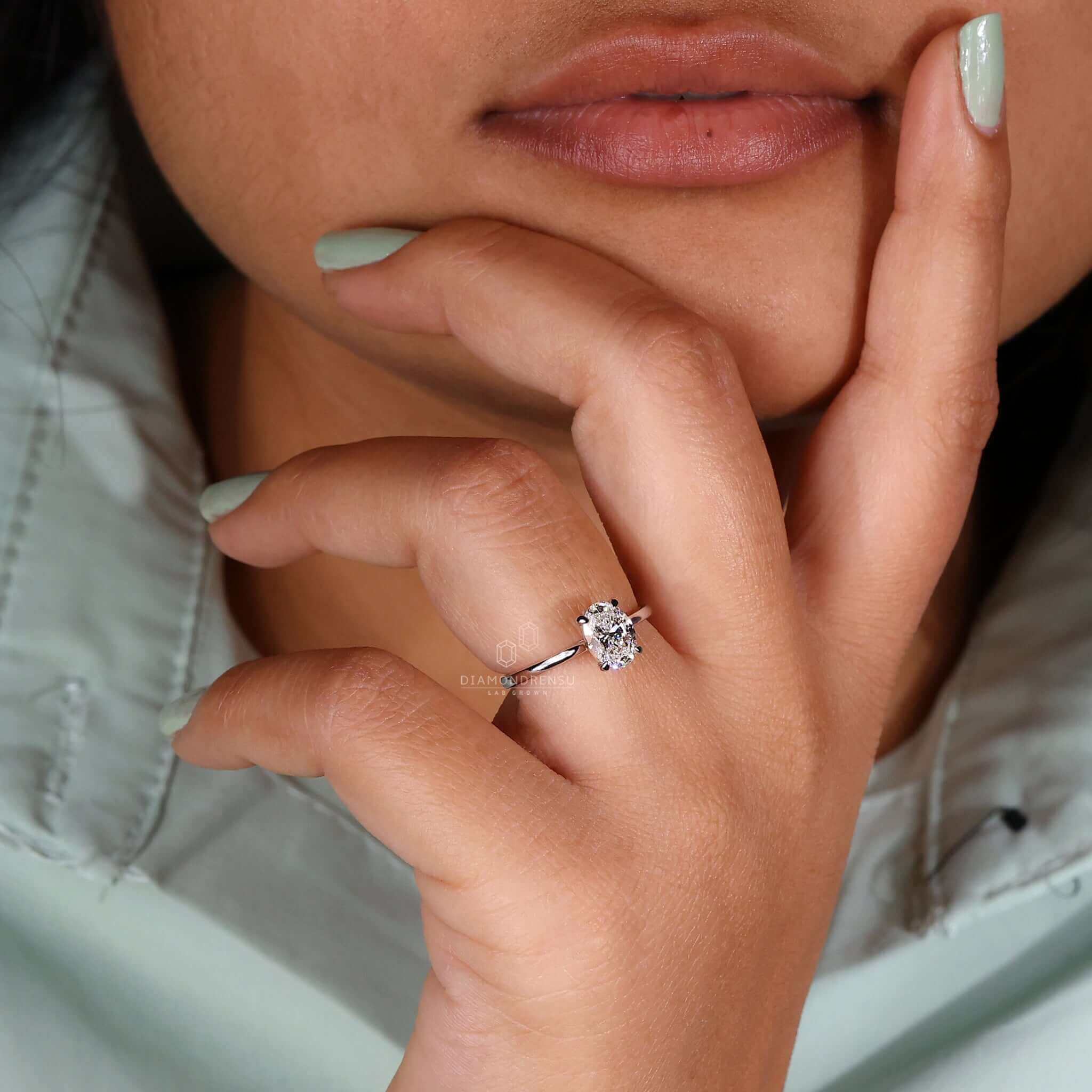 Oval solitaire engagement ring with a handmade touch for UK buyers.