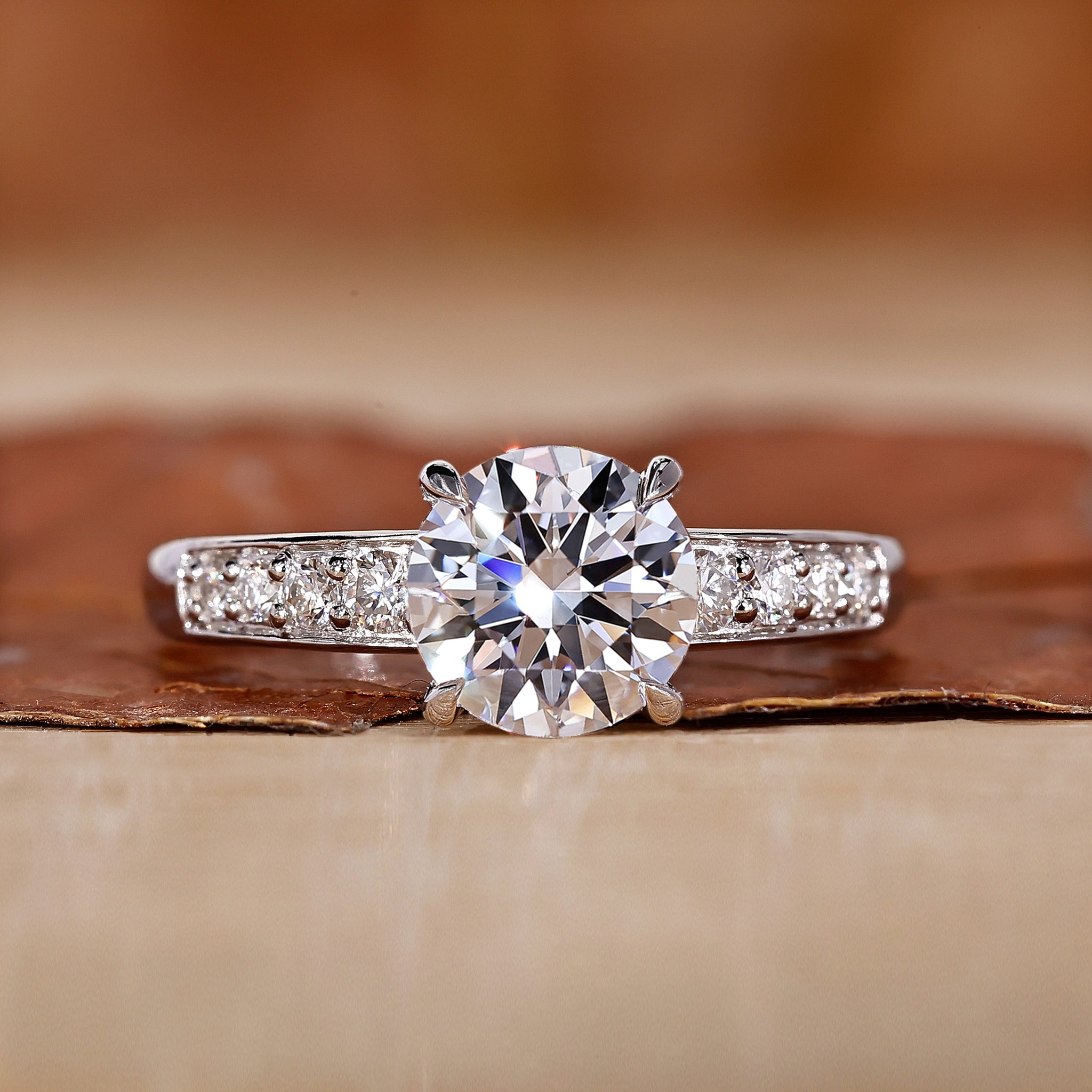 Hidden halo engagement ring with round diamond ring.