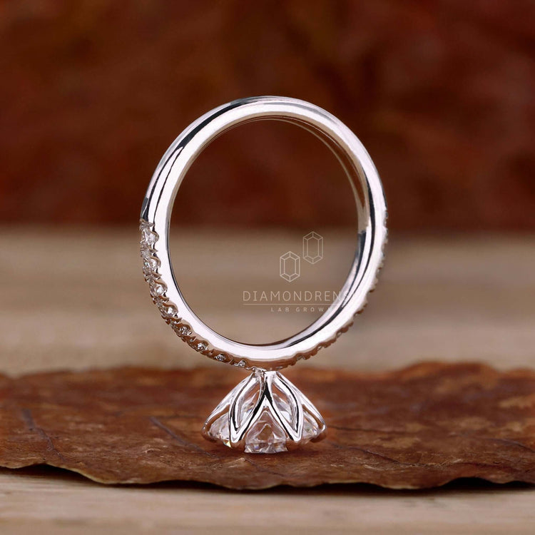 Pave diamond ring with a brilliant cut diamond, ideal for a custom-made diamondrensu UK engagement ring.