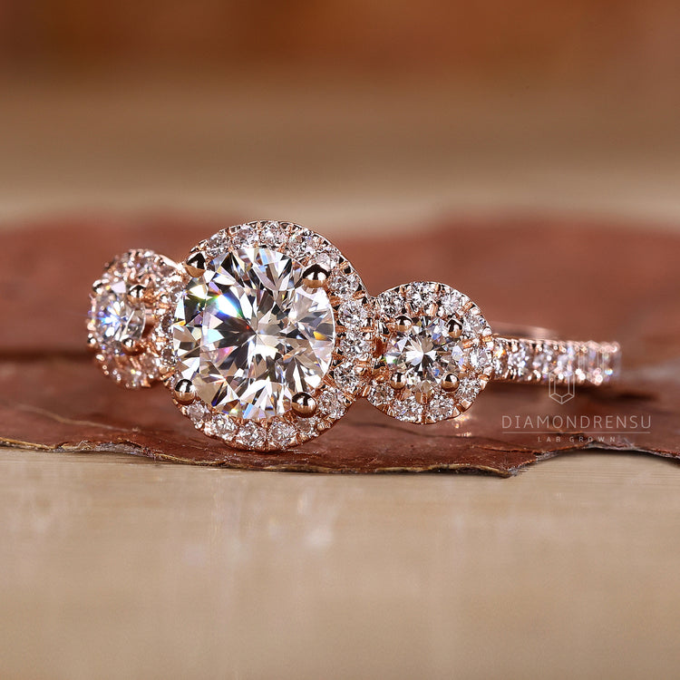 Halo setting with round cut center diamond.