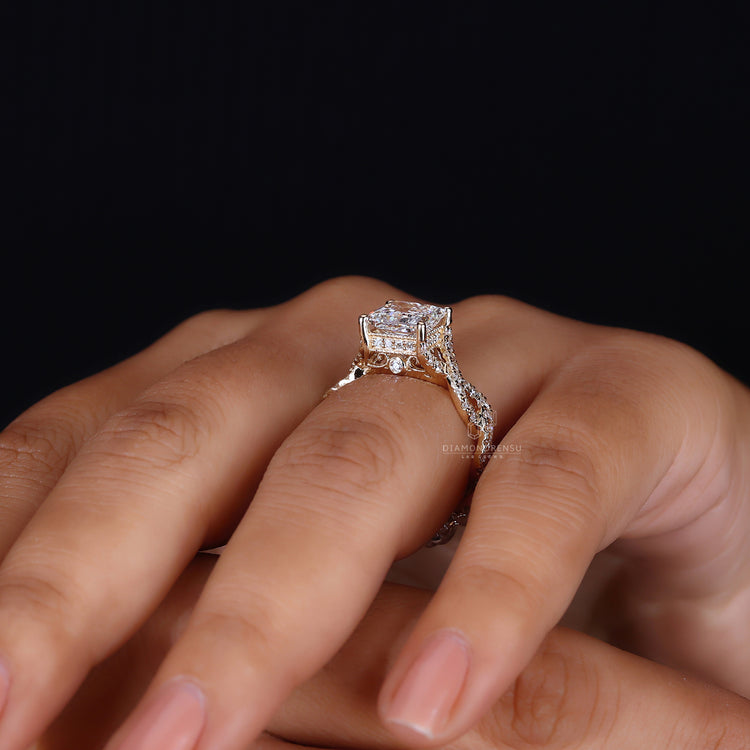 Hidden halo engagement ring is placed under the princess cut diamond.