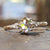 Round Rose Cut Moissanite Engagement Ring featuring a classic round cut ring design. Round Rose Cut Moissanite Engagement Ring featuring a classic round cut ring design.