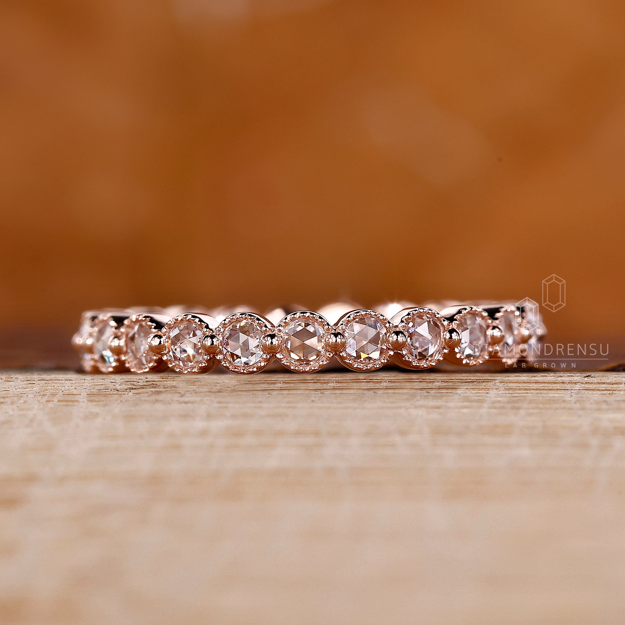 IGI certified diamond wedding band in shared prong setting.