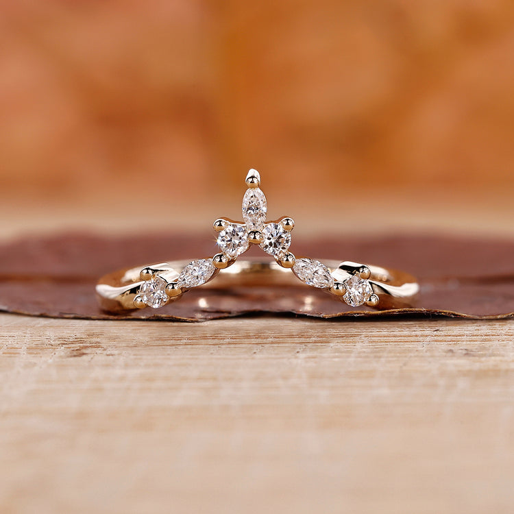 Round and marquise diamond wedding band.