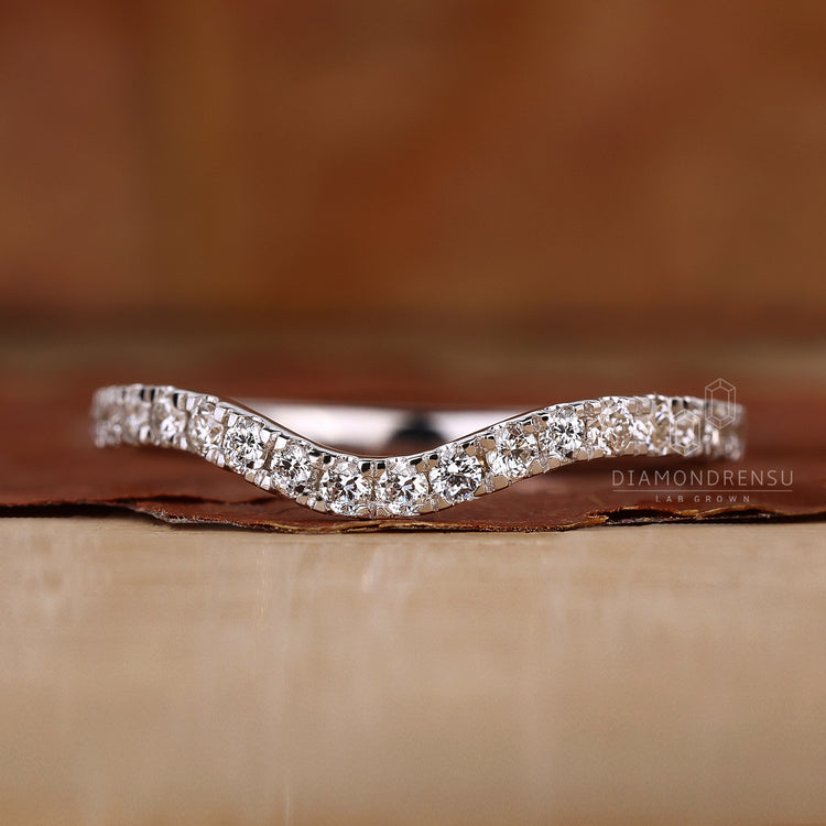 Lab grown diamond curved wedding band UK.
