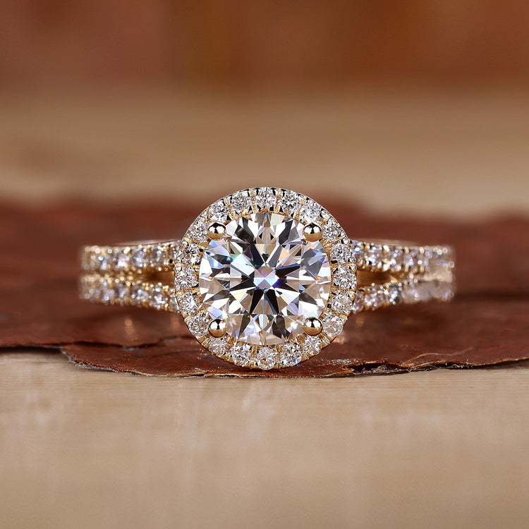 Split shank engagement ring in yellow gold.