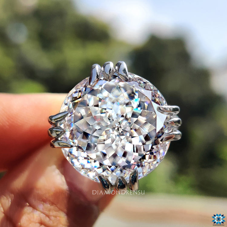 Handmade ring crafted in white gold with vintage milgrain accents.