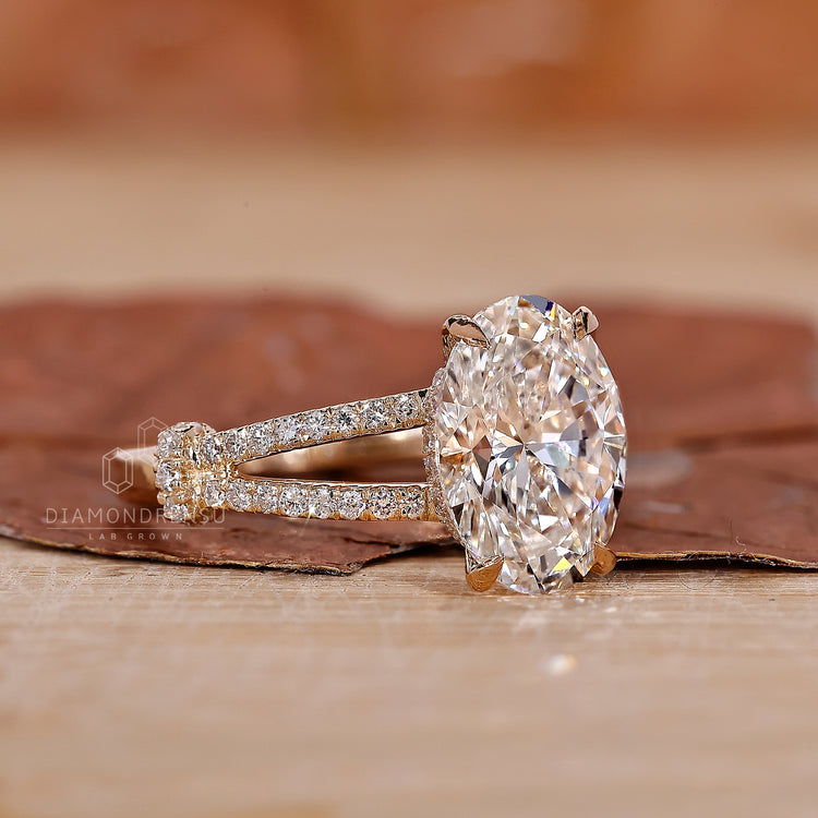 Handmade jewelry featuring a hidden halo engagement ring design.
