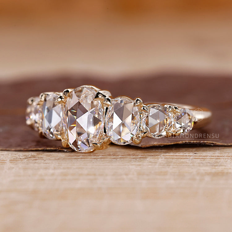 7 stone ring featuring rose cut lab grown diamonds.