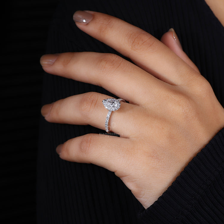 Halo engagement ring with round cut.