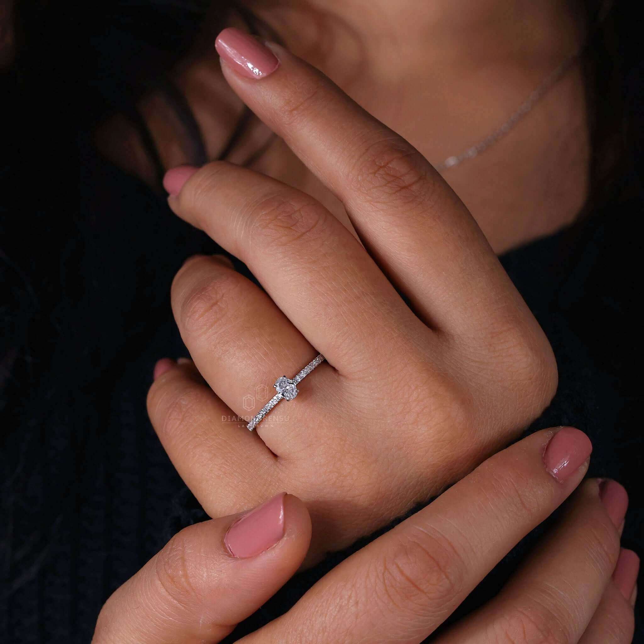 Hidden halo oval engagement ring featuring a Lab Grown Diamond in a unique design for modern brides.