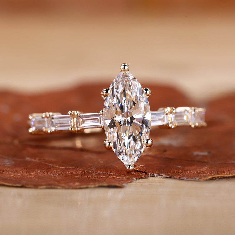 Marquise cut diamond ring in yellow gold.