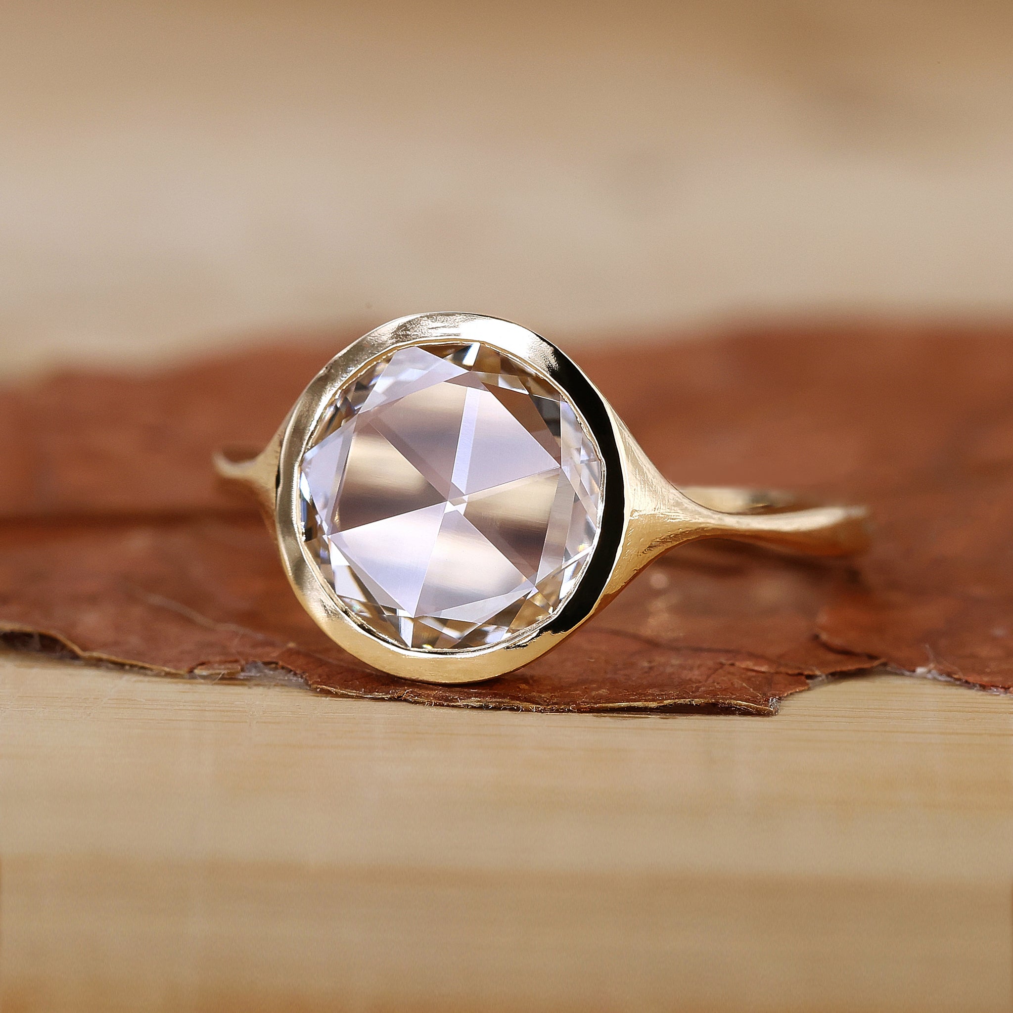 Rose cut diamond ring in yellow gold setting.