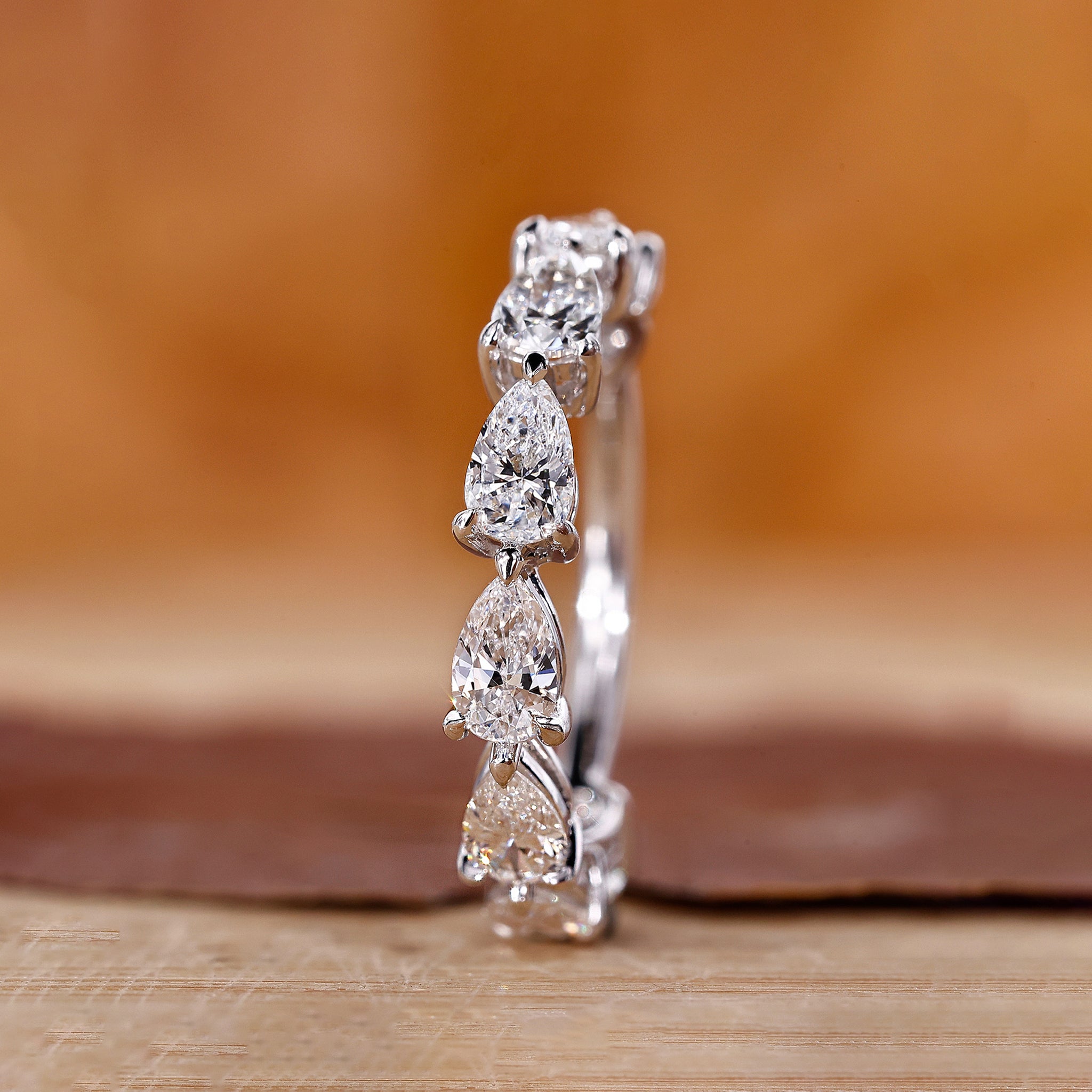 Pear diamond wedding band in white gold.