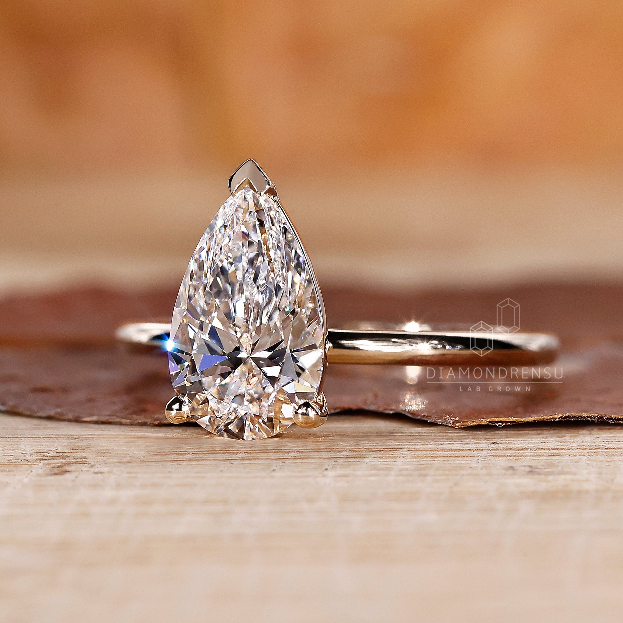 Unique ring crafted in yellow gold with V prongs.