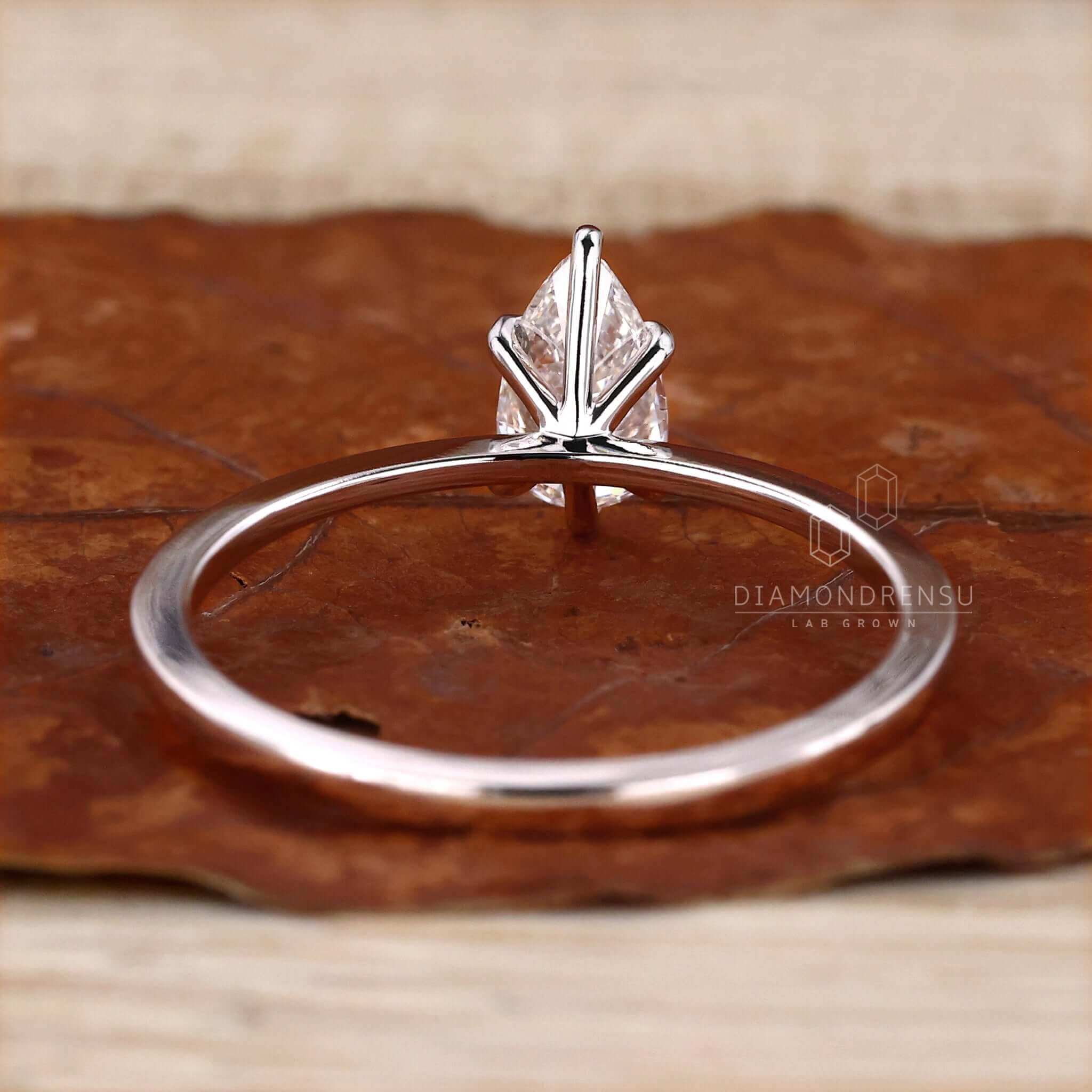 Unique pear cut diamond ring with lab-grown diamonds.