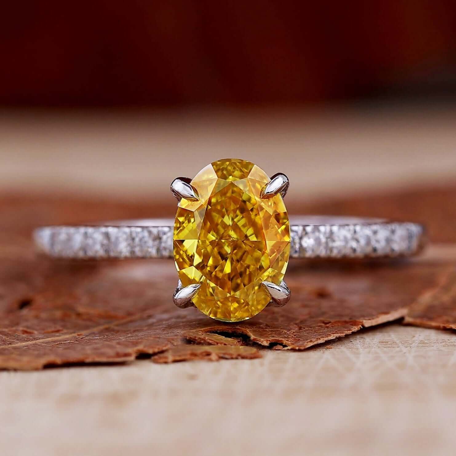 Yellow diamond ring with a stunning hidden halo and pave setting for a modern and elegant look.
ring