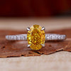 Yellow diamond ring with a stunning hidden halo and pave setting for a modern and elegant look.
ring