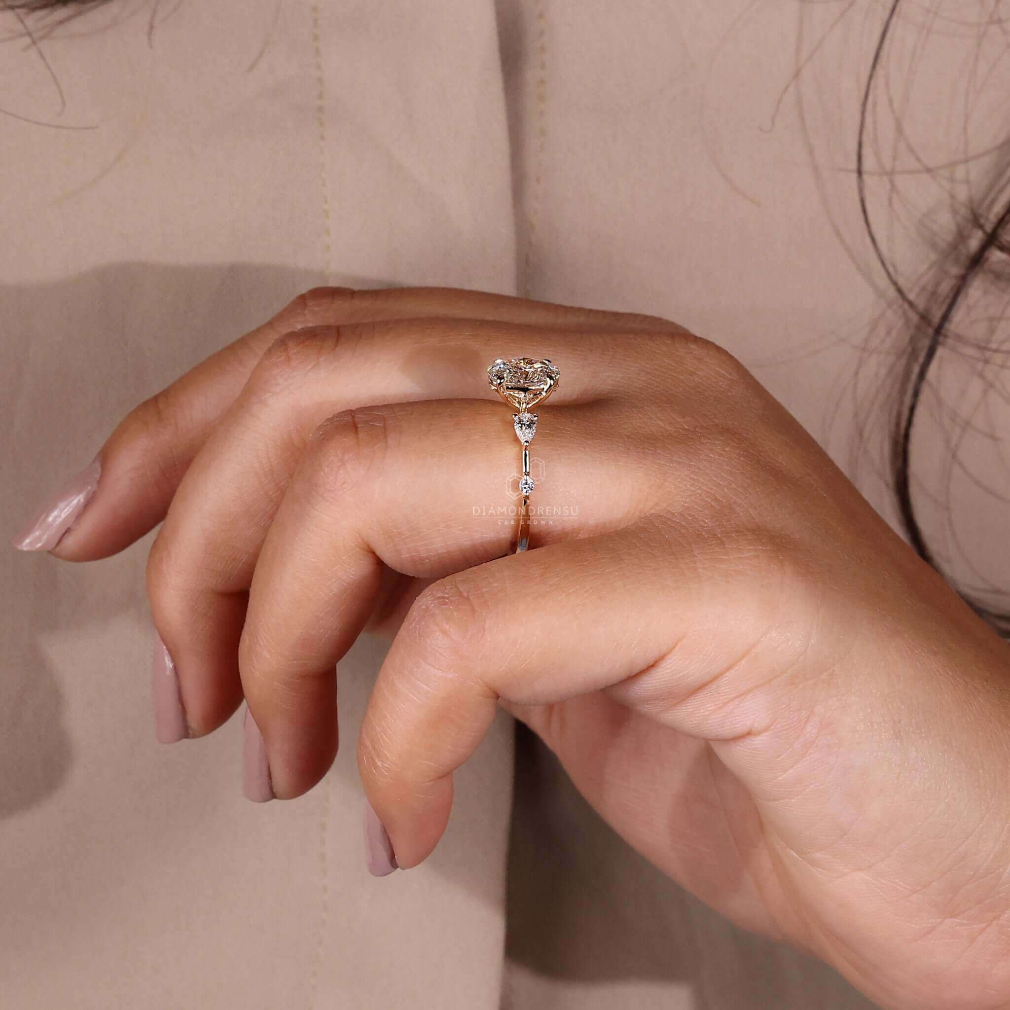 Pear cut engagement ring with an elegant claw prong setting, perfect for women who love a unique engagement ring design.